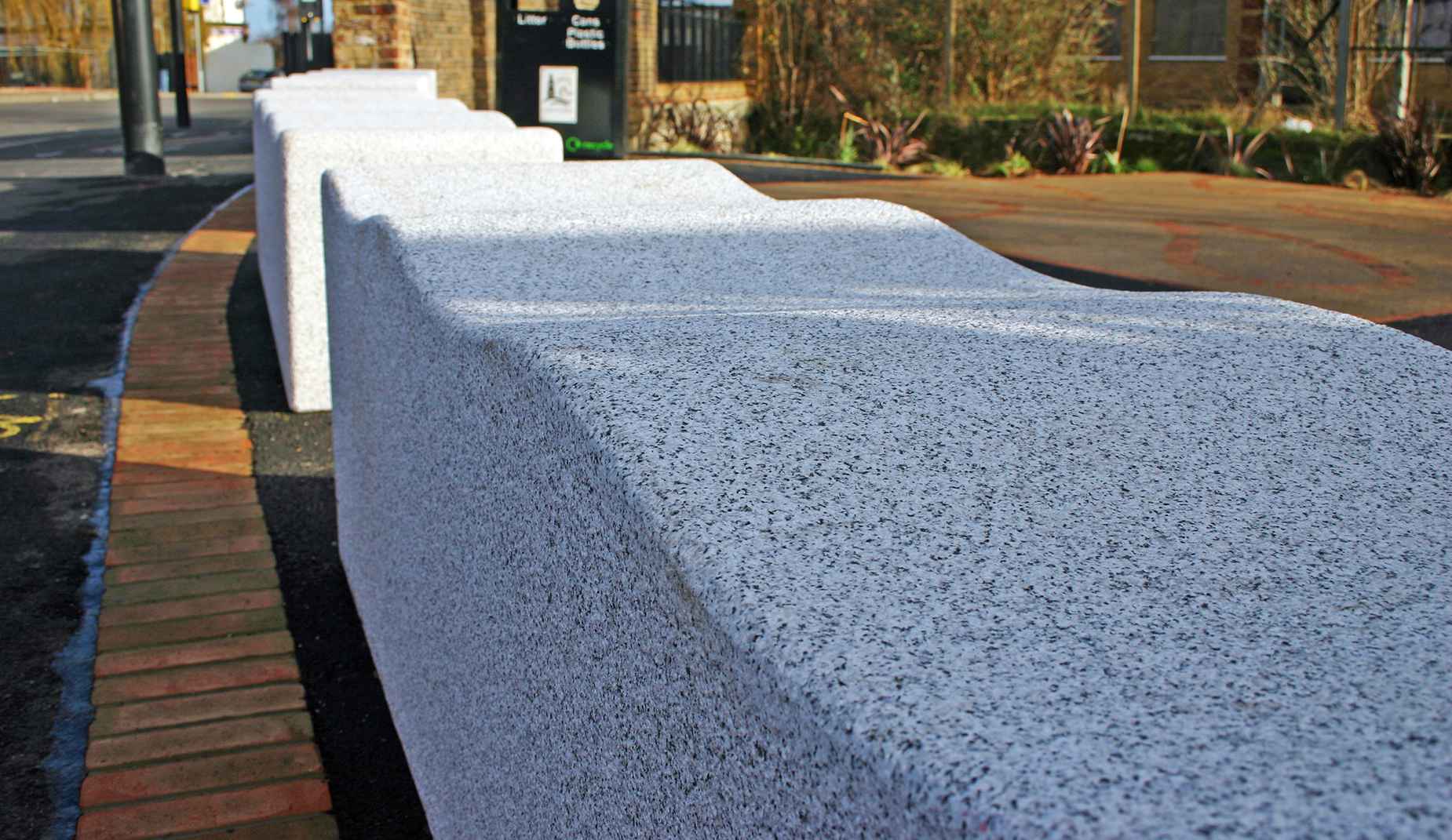 Serpentine bench in granite Factory Furniture