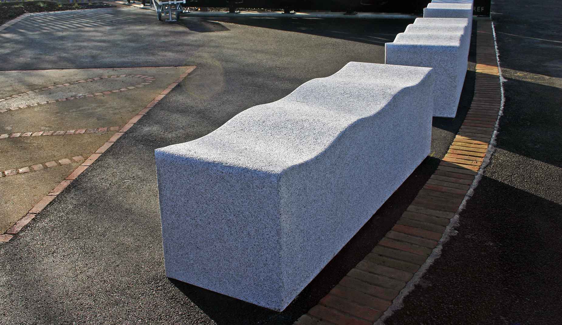 Serpentine bench in granite Factory Furniture