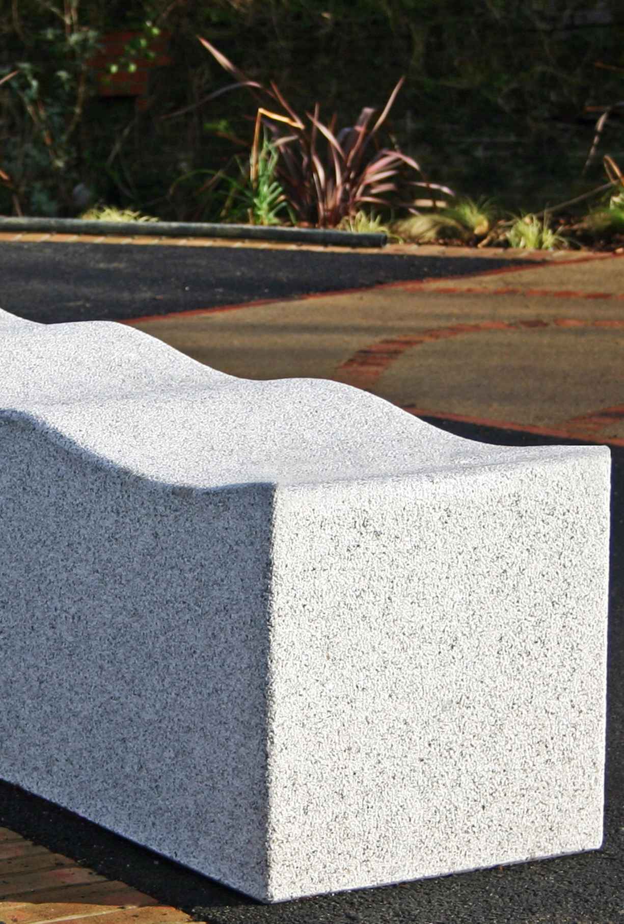 Serpentine bench in granite Factory Furniture